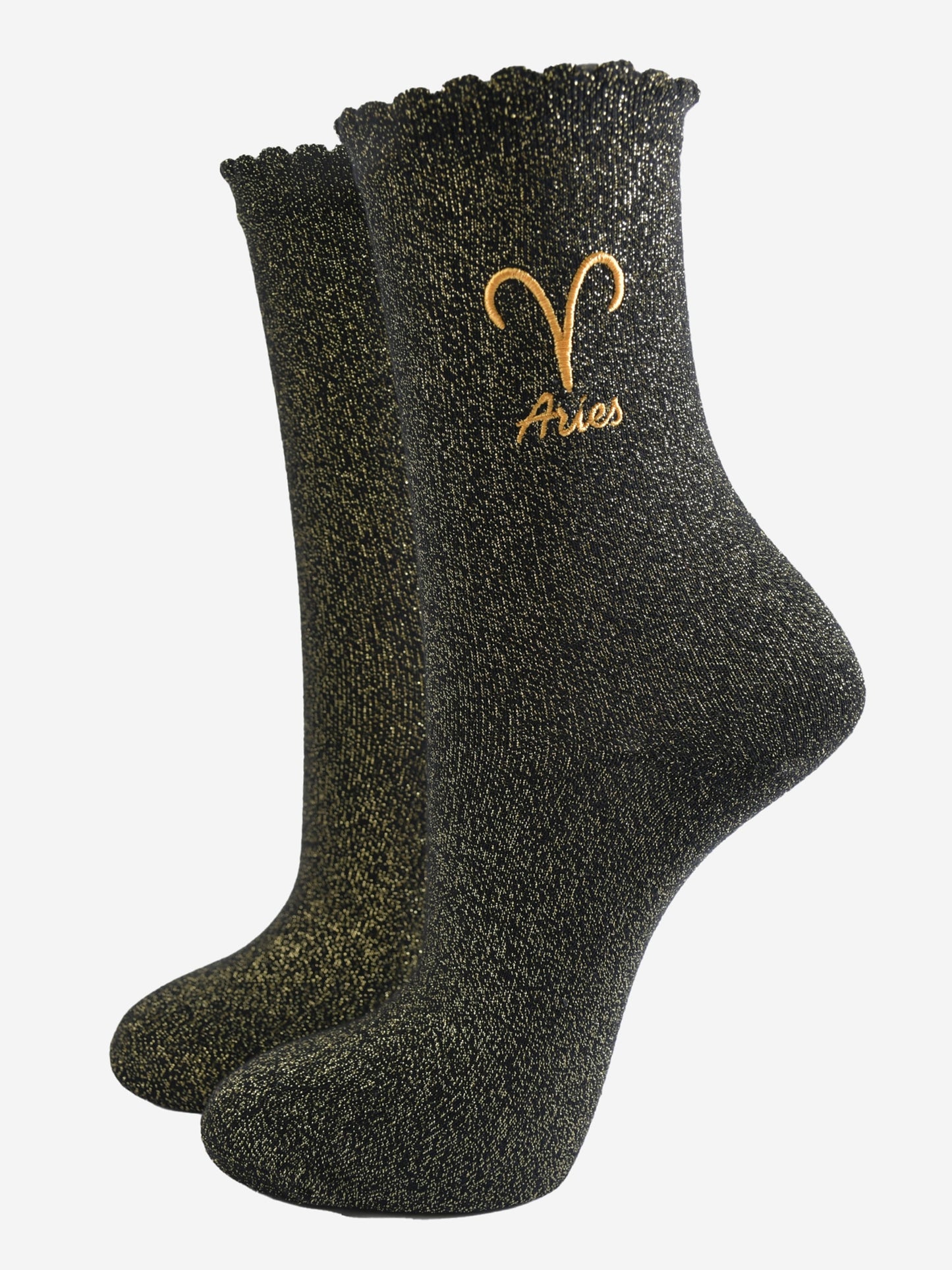 black and gold sparkly ankle socks with a scalloped cuff and an gold embroidered aries zodiac symbol and name