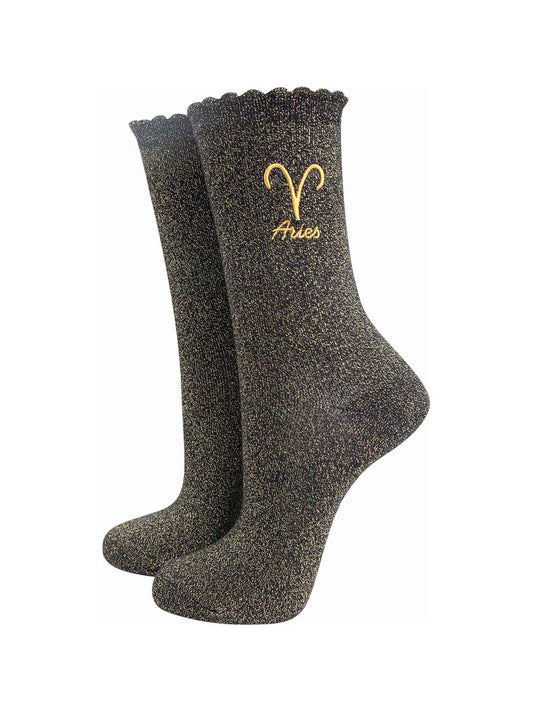 black and gold sparkly ankle socks with a scalloped cuff and an gold embroidered aries zodiac symbol and name