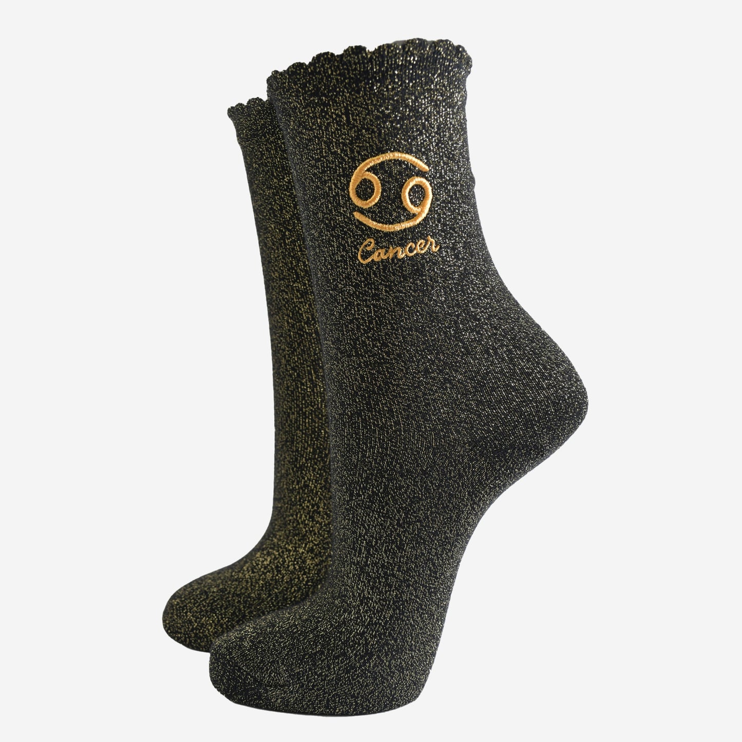 black and gold sparkly ankle socks with a scalloped cuff and an gold embroidered cancer zodiac symbol and name