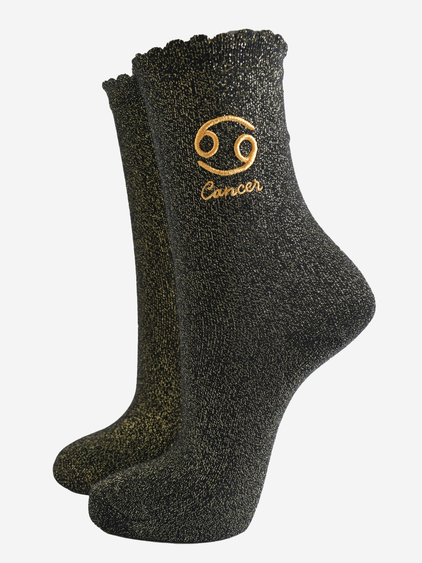 black and gold sparkly ankle socks with a scalloped cuff and an gold embroidered cancer zodiac symbol and name