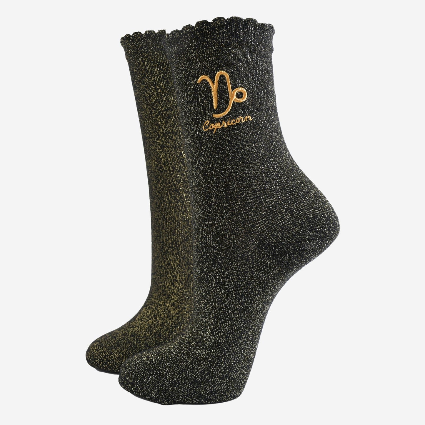 black and gold sparkly ankle socks with a scalloped cuff and an gold embroidered capricorn zodiac symbol and name