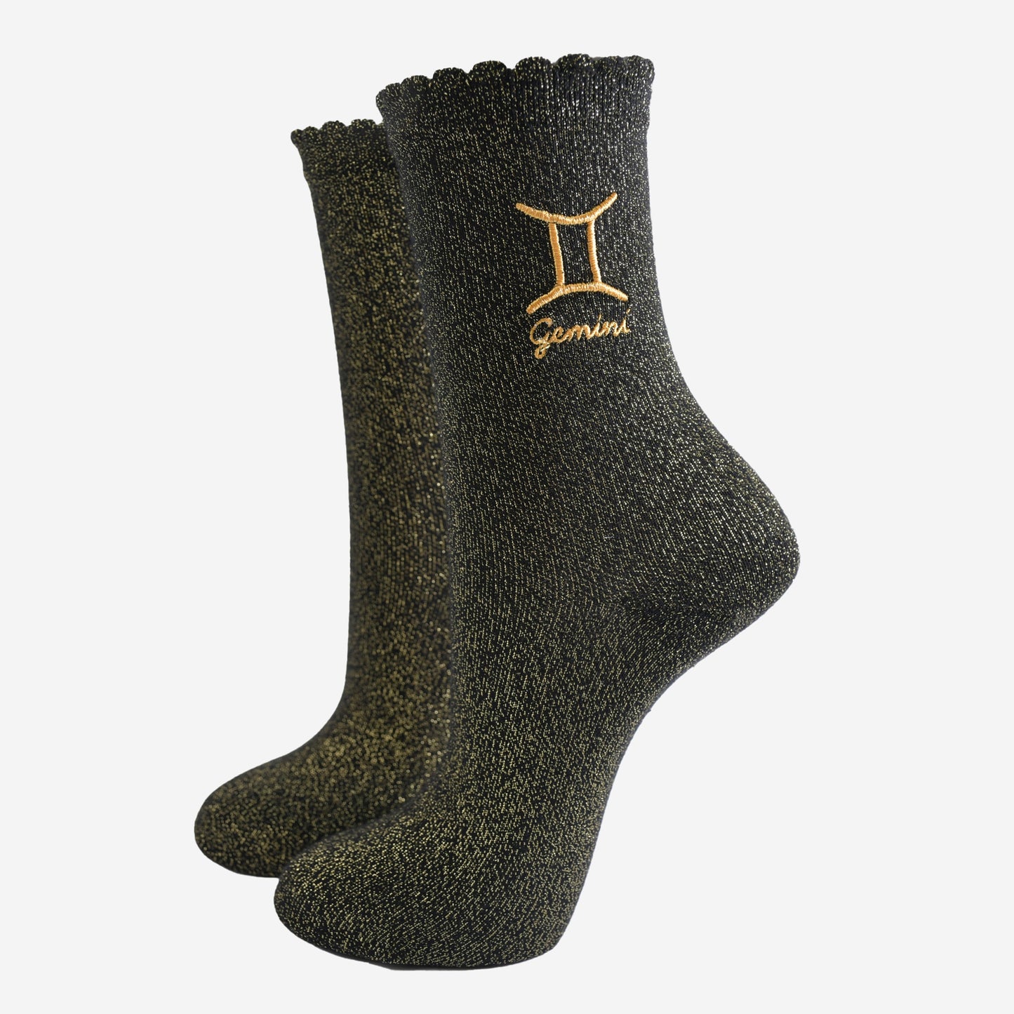 black and gold sparkly ankle socks with a scalloped cuff and an gold embroidered gemini zodiac symbol and name