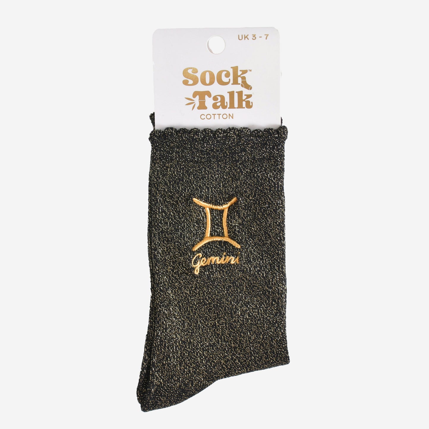 gold and black glitter gemini socks in their sock talk packaging, these socks are a uk size 3-7