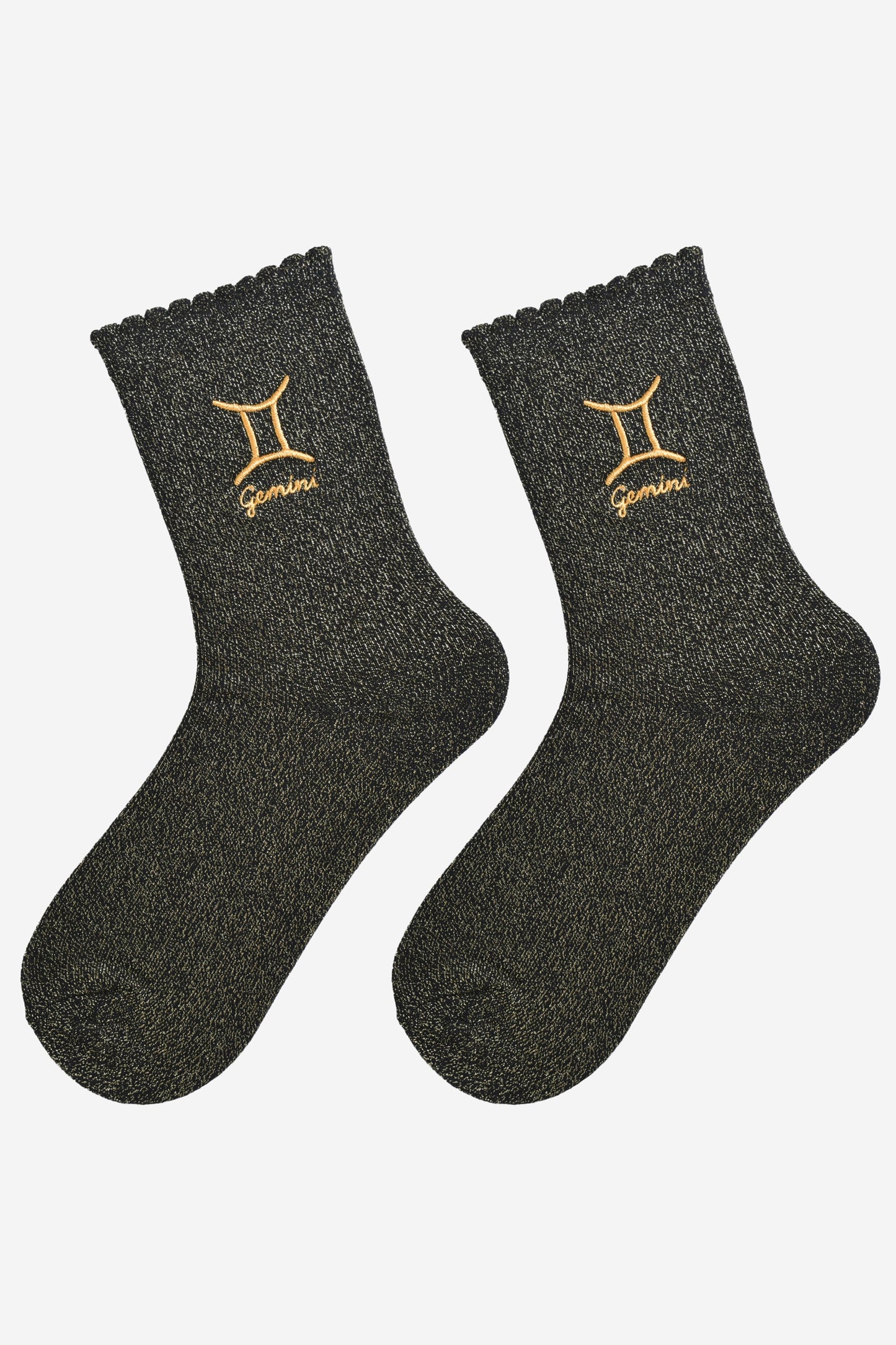 black and gold glitter embroidered gemini socks laying flat, showing the all over gold glitter sparkle