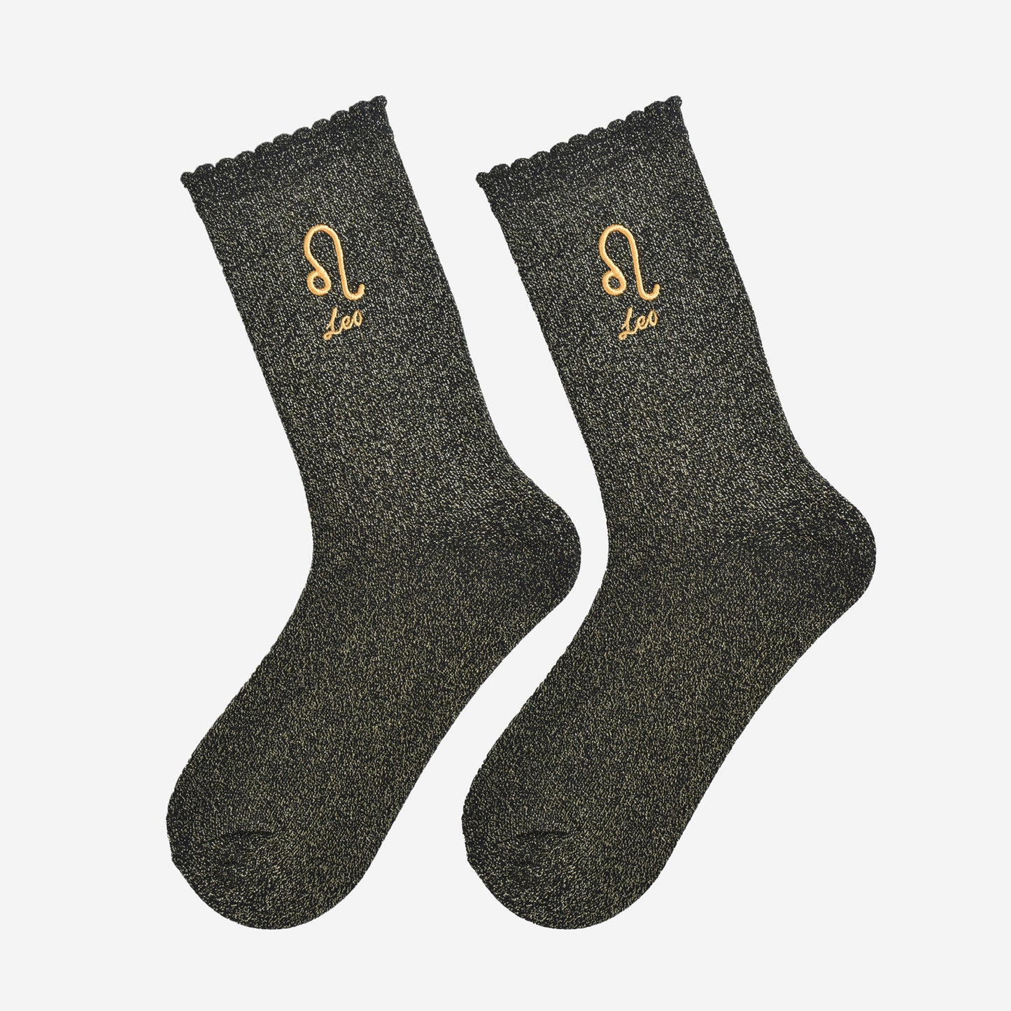 black and gold glitter embroidered leo socks laying flat, showing the all over gold glitter sparkle