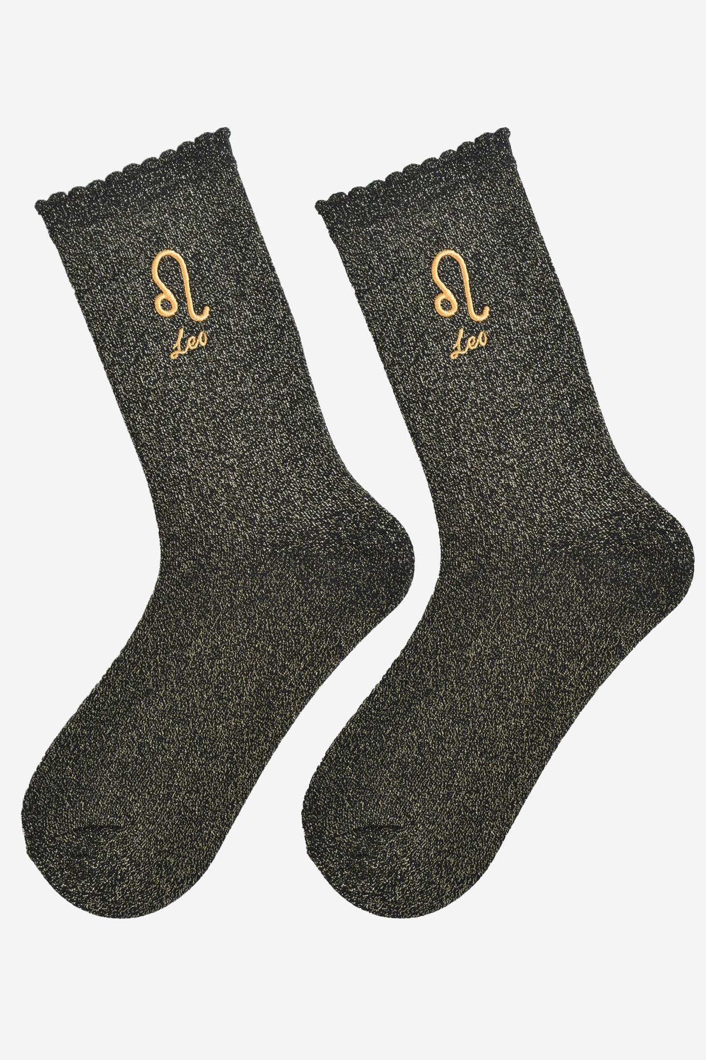 black and gold glitter embroidered leo socks laying flat, showing the all over gold glitter sparkle