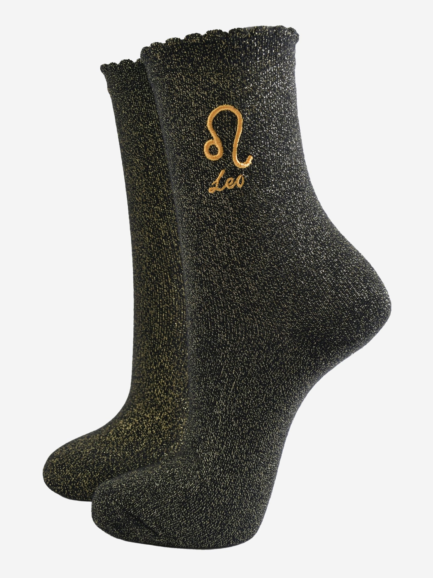 black and gold sparkly ankle socks with a scalloped cuff and an gold embroidered leo zodiac symbol and name