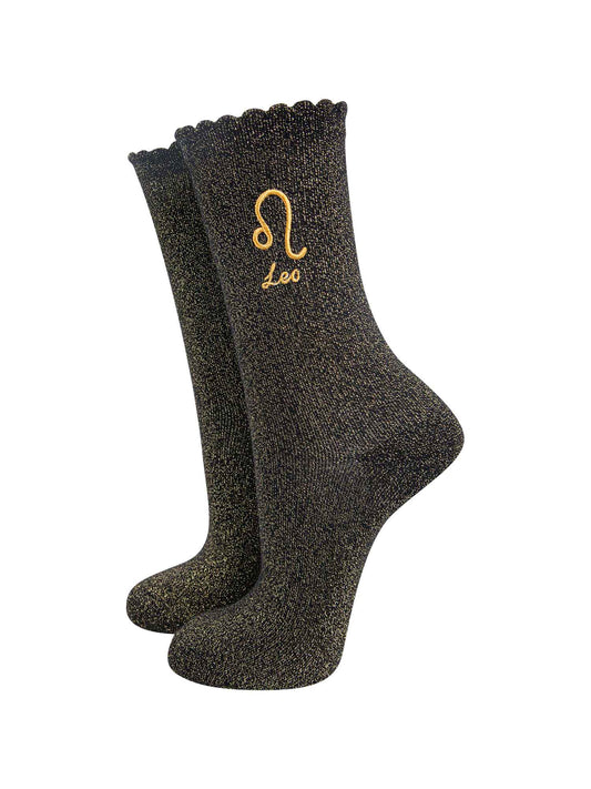 black and gold sparkly ankle socks with a scalloped cuff and an gold embroidered leo zodiac symbol and name