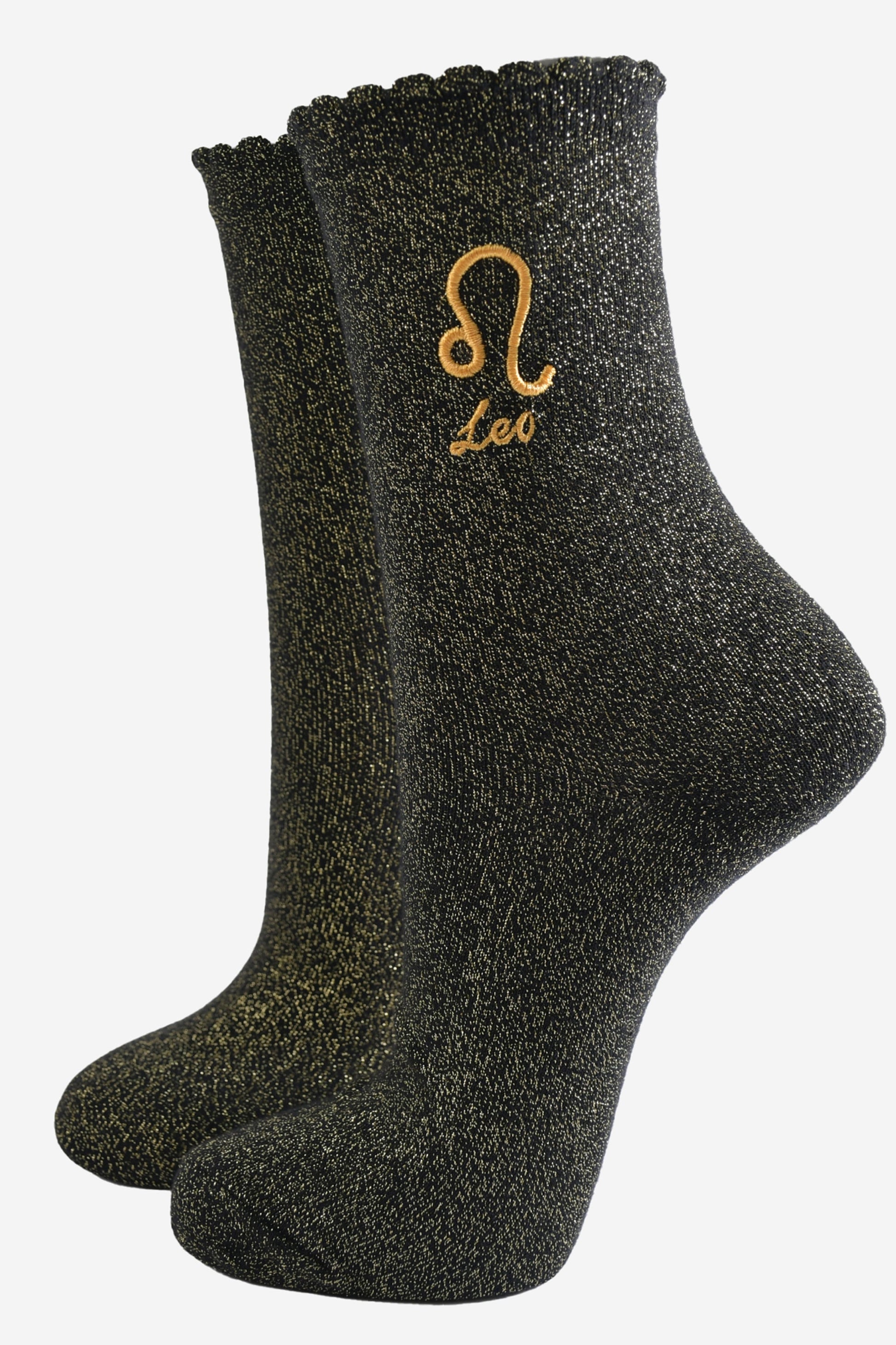 black and gold sparkly ankle socks with a scalloped cuff and an gold embroidered leo zodiac symbol and name