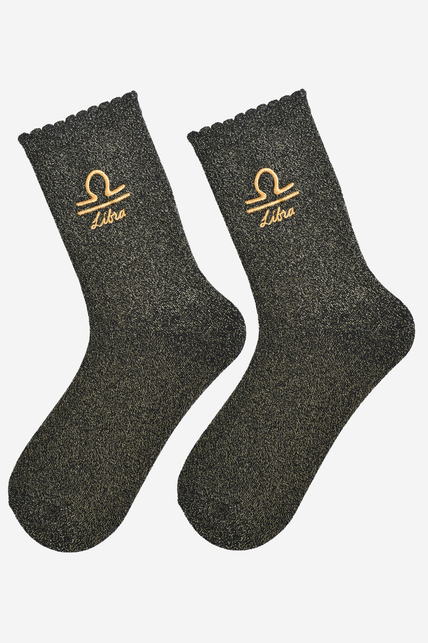 black and gold glitter embroidered libra socks laying flat, showing the all over gold glitter sparkle