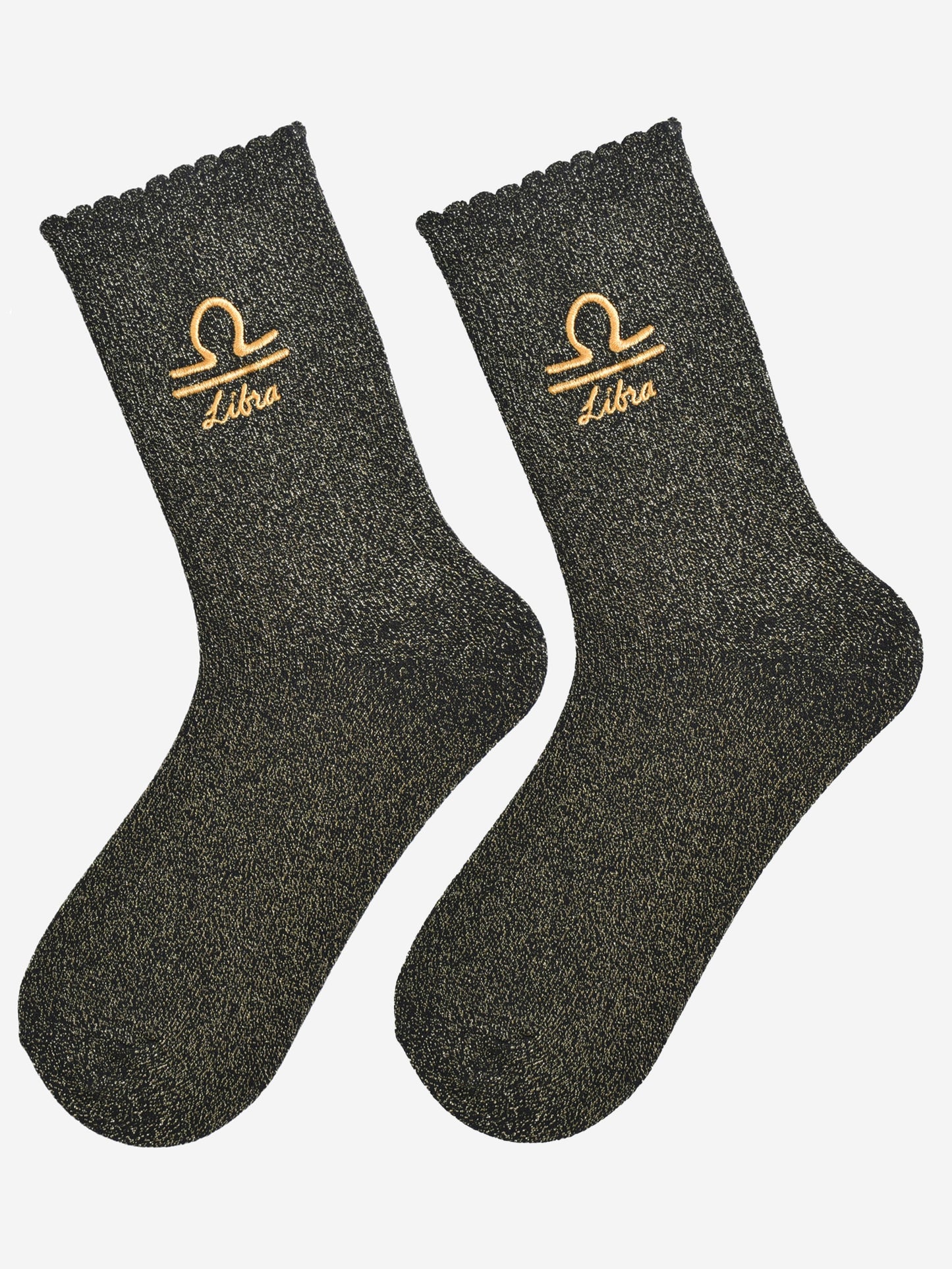 black and gold glitter embroidered libra socks laying flat, showing the all over gold glitter sparkle