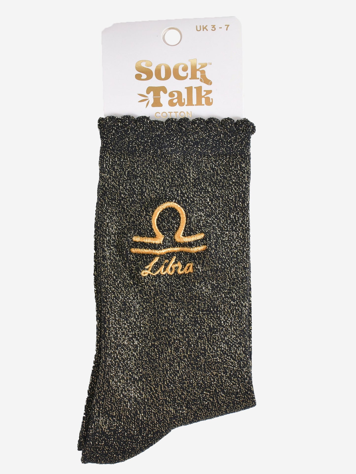 gold and black glitter libra socks in their sock talk packaging, these socks are a uk size 3-7