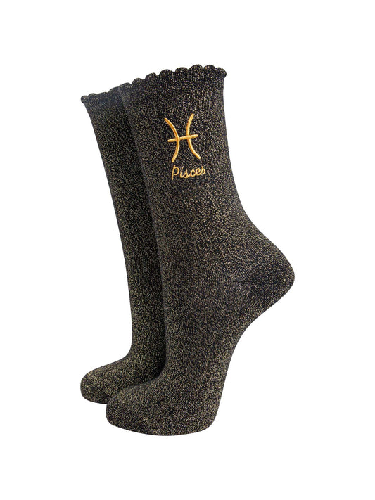 black and gold sparkly ankle socks with a scalloped cuff and an gold embroidered pisces zodiac symbol and name