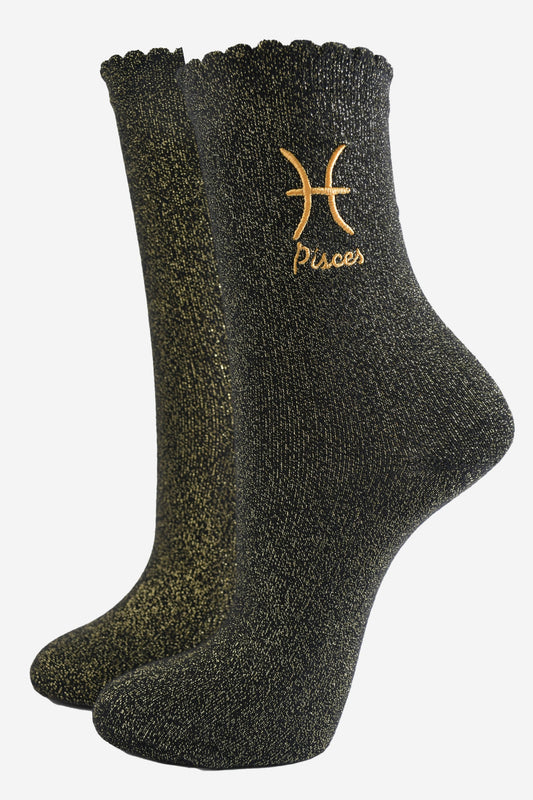 black and gold sparkly ankle socks with a scalloped cuff and an gold embroidered pisces zodiac symbol and name