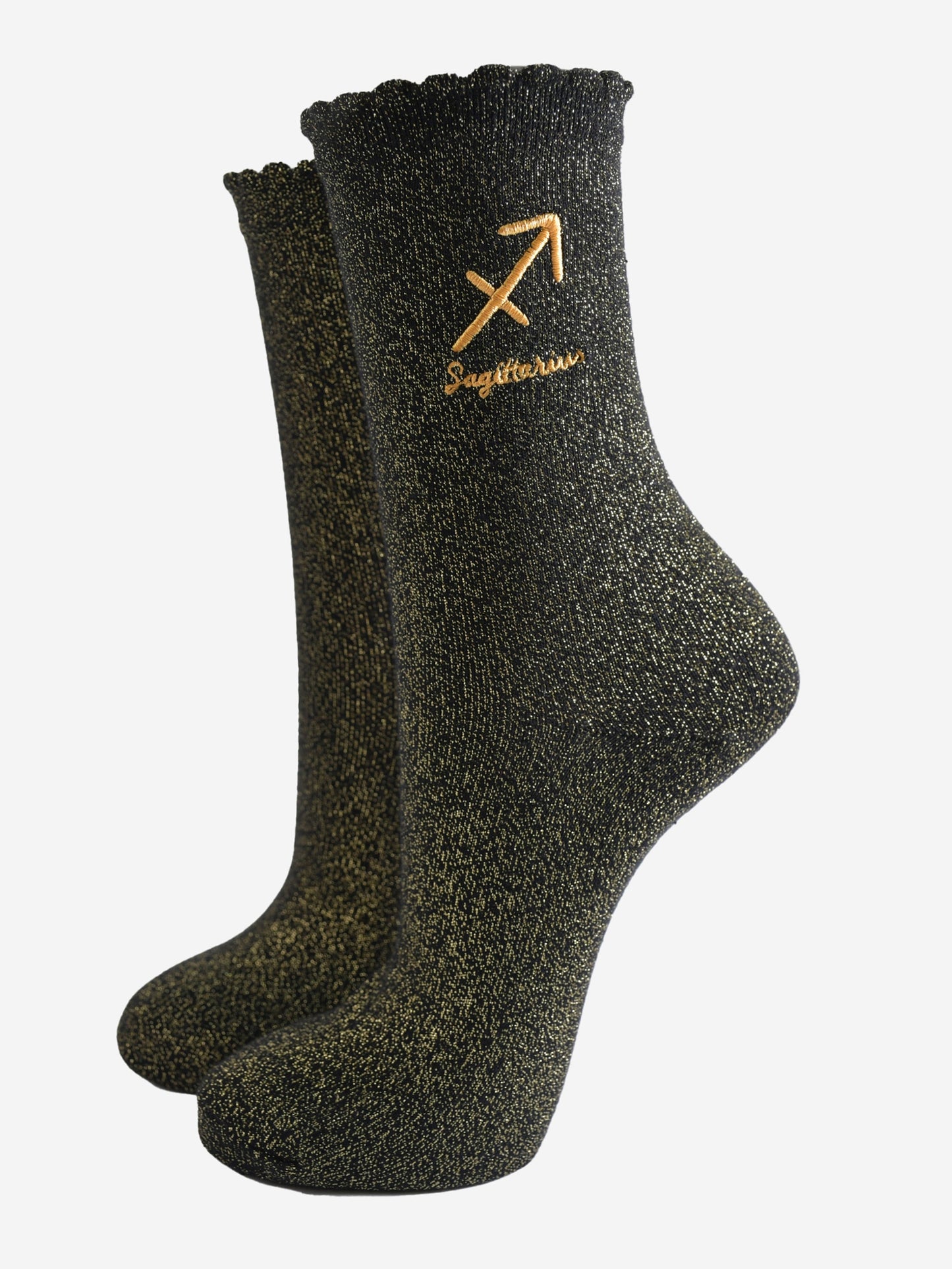 black and gold sparkly ankle socks with a scalloped cuff and an gold embroidered sagittarius zodiac symbol and name