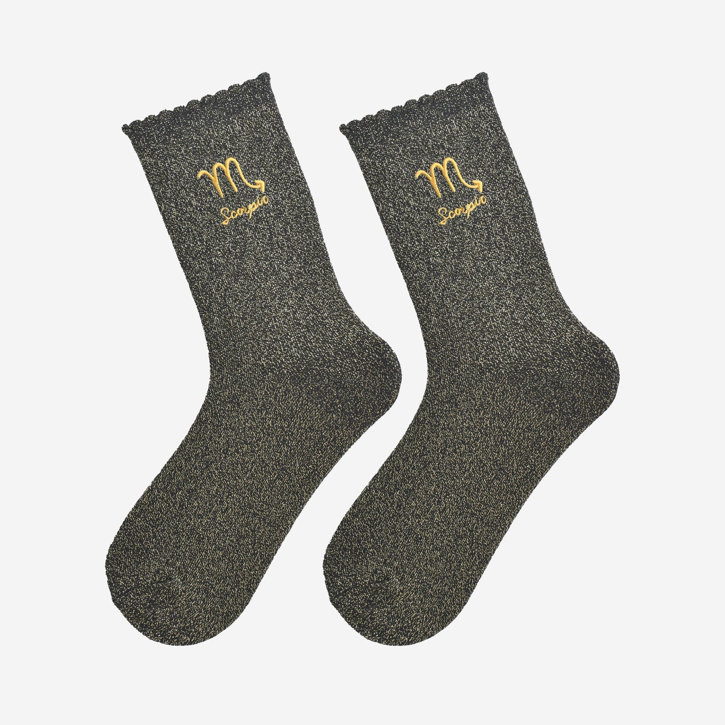 black and gold glitter embroidered scorpio socks laying flat, showing the all over gold glitter sparkle