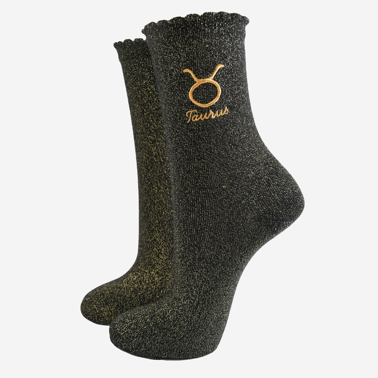 black and gold sparkly ankle socks with a scalloped cuff and an gold embroidered taurus zodiac symbol and name