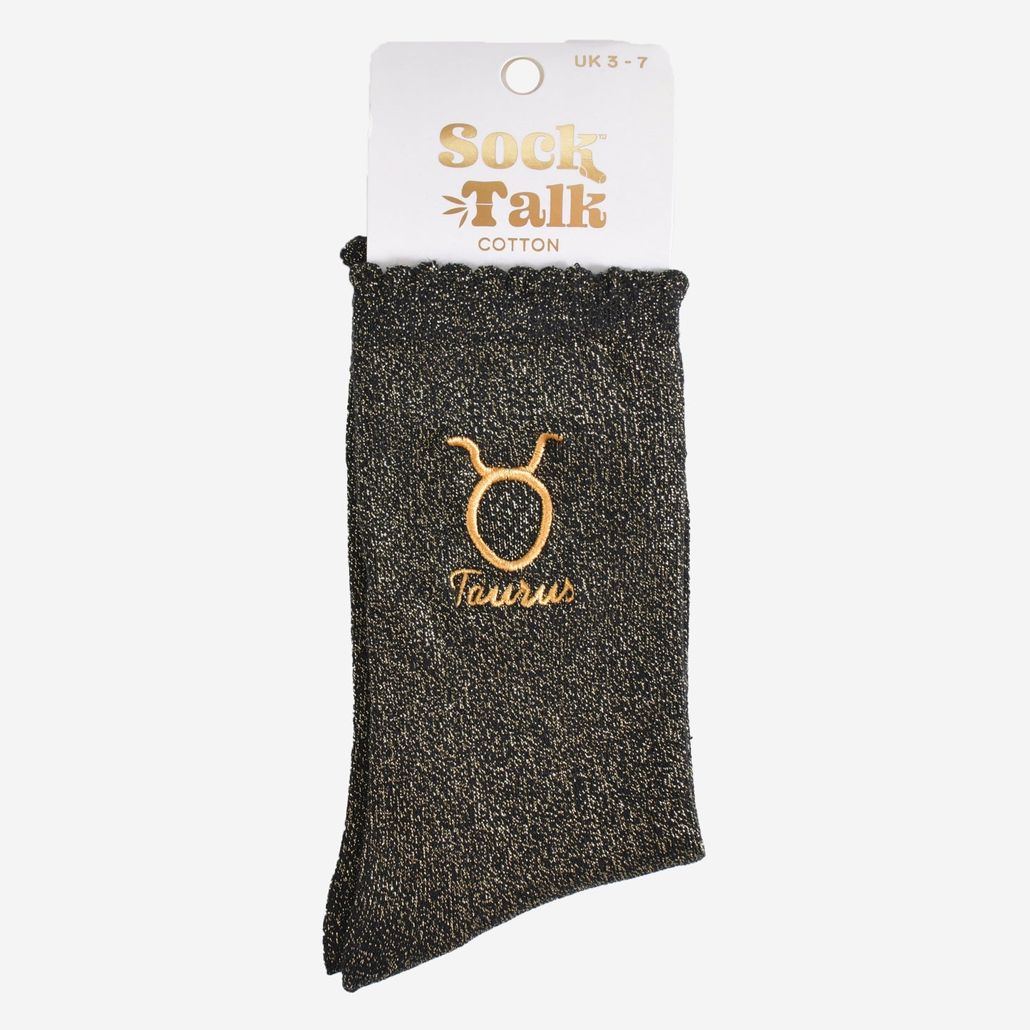 gold and black glitter taurus socks in their sock talk packaging, these socks are a uk size 3-7