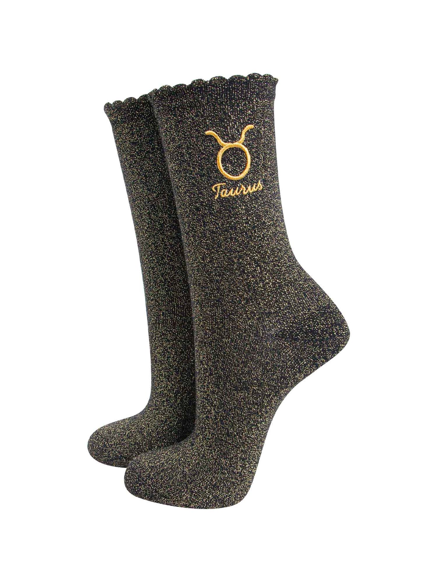 black and gold sparkly ankle socks with a scalloped cuff and an gold embroidered taurus zodiac symbol and name