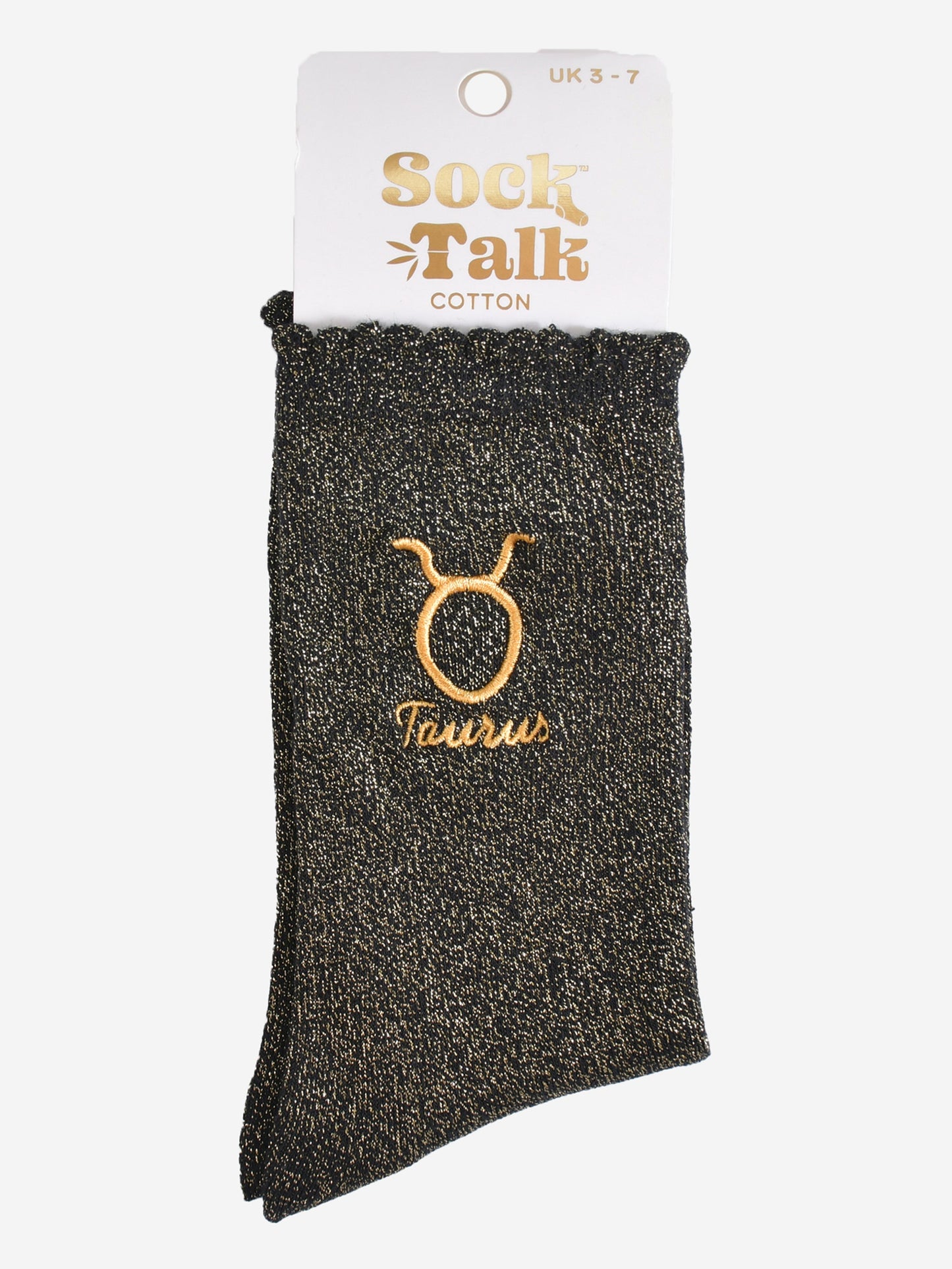 gold and black glitter taurus socks in their sock talk packaging, these socks are a uk size 3-7