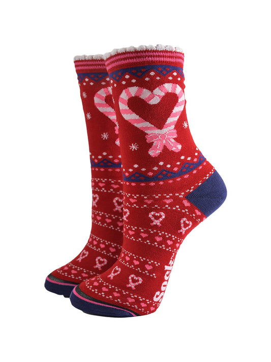 red bamboo socks with a pattern of pink love hearts made from adjoining candy canes