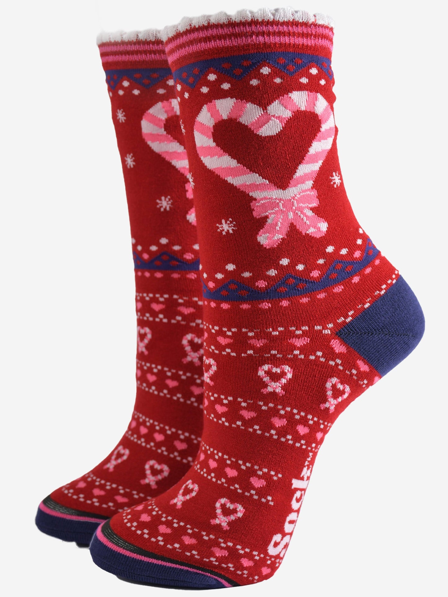 red bamboo socks with a pattern of pink love hearts made from adjoining candy canes