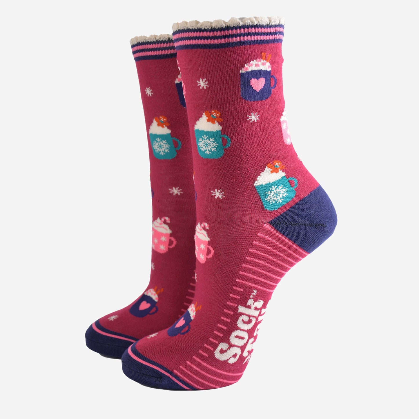 berry red bamboo socks with a pattern of hot winter drinks, candy canes and gingerbread men