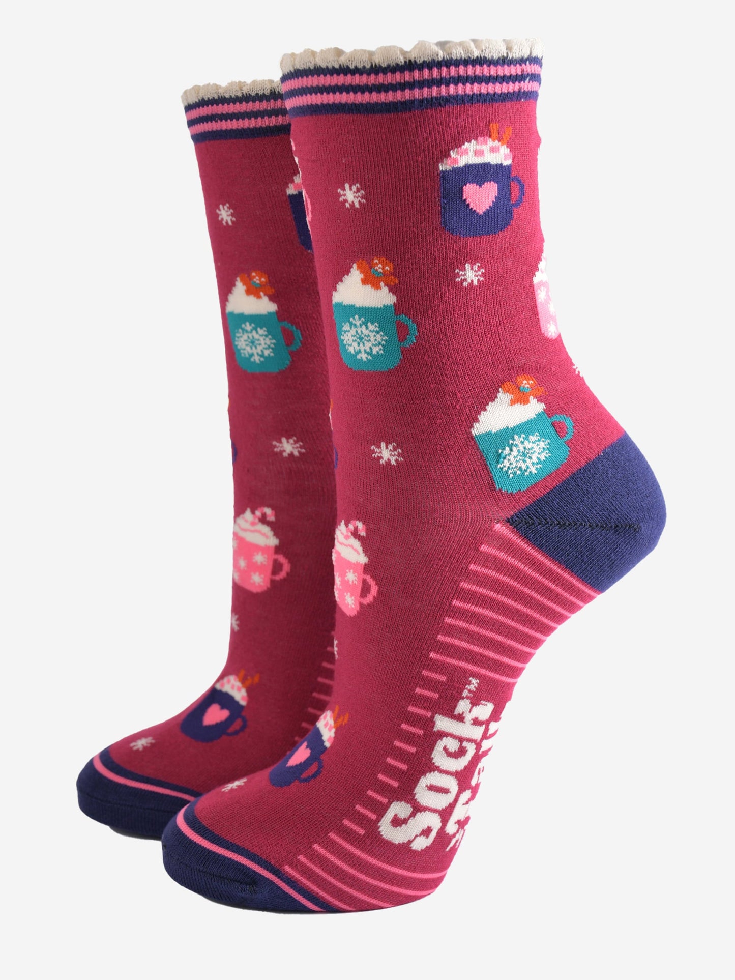 berry red bamboo socks with a pattern of hot winter drinks, candy canes and gingerbread men