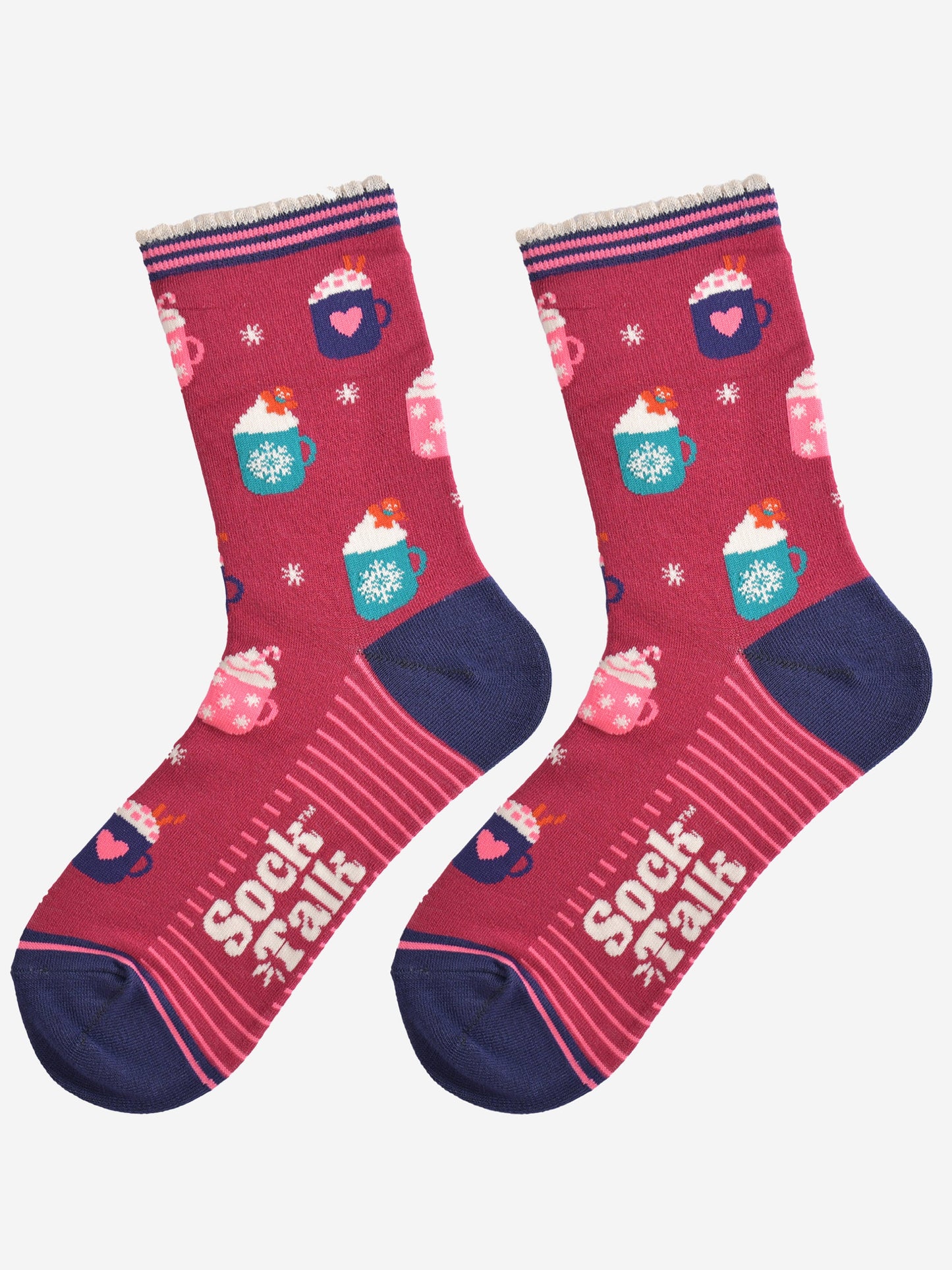 showing the hot drinks socks laying flat, the sole has a pink striped pattern, the toe and heel are navy blue and contrast the berry red colour of the socks, the festive hot drinks pattern is all over the design.