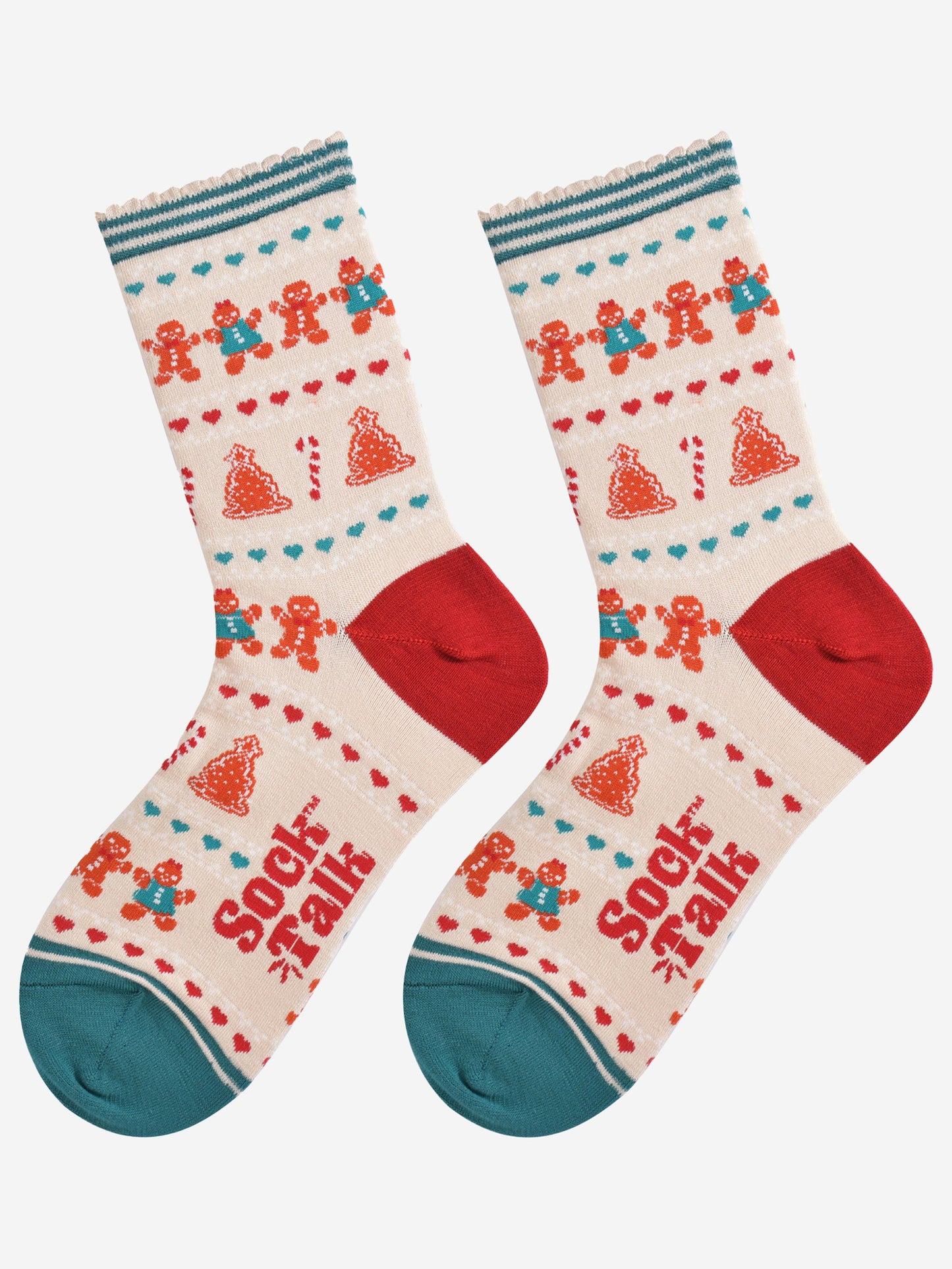 showing the festive gingerbread socks laying flat, the fair isle pattern is all over the socks and features gingerbread men, gingerbread women, gingerbread xmas tree cookies, candy canes and love hearts