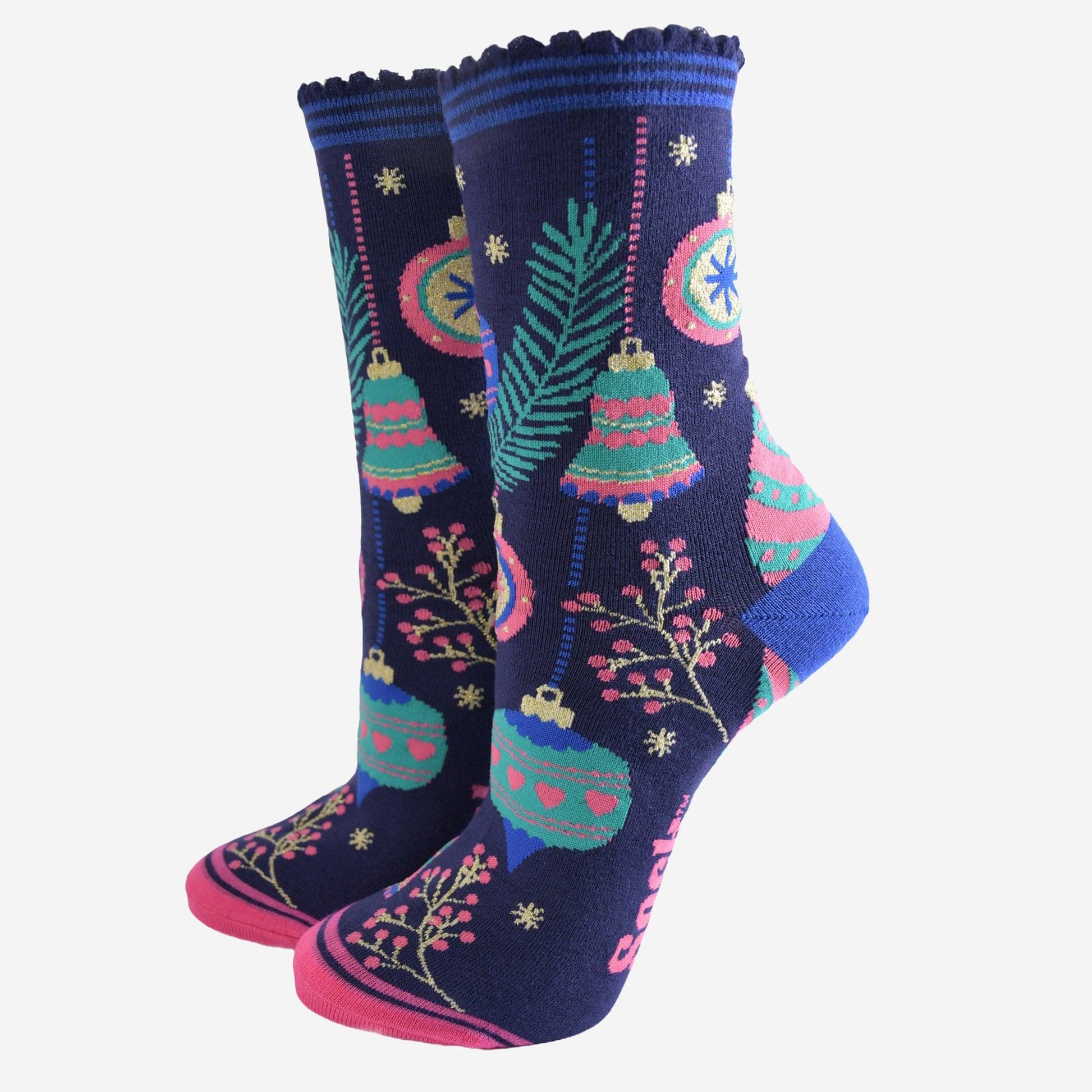 navy blue socks with colourful christmas tree baubles and bells, pink berries and gold starbursts. 