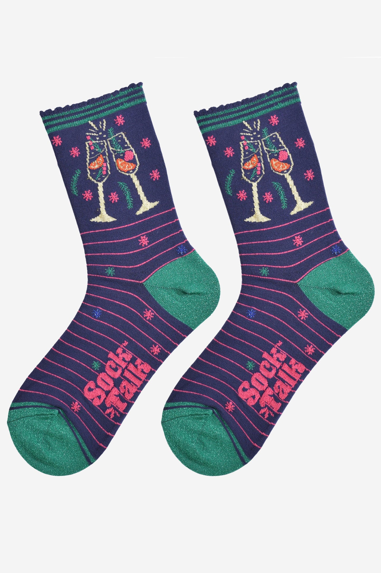 showing the prosecco cocktail socks laying flat, there are sparkly accents all over the design, the toe and heel are green and there is a pink pink stripe throughout the design, the cocktail glasses are shown on the ankle