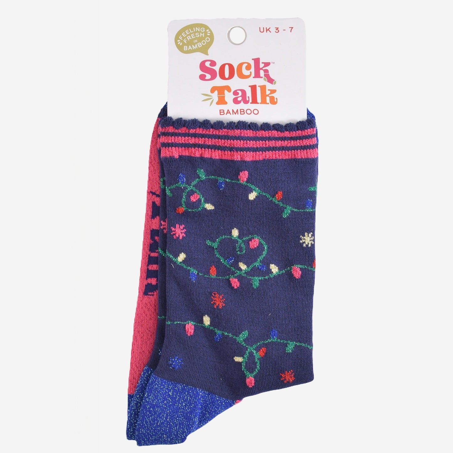 festive party lights bamboo socks in their sock talk packaging, these socks are a uk size 3-7