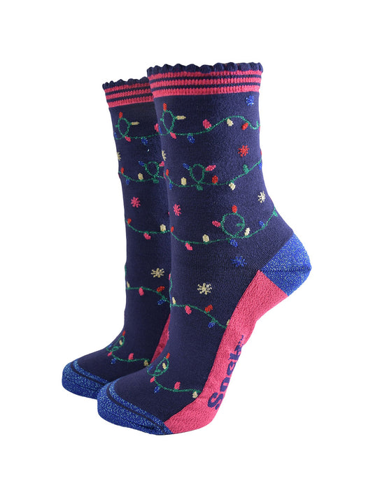 navy blue socks with  blue glitter heel and toe with an all over pattern of colouful party lights on a string