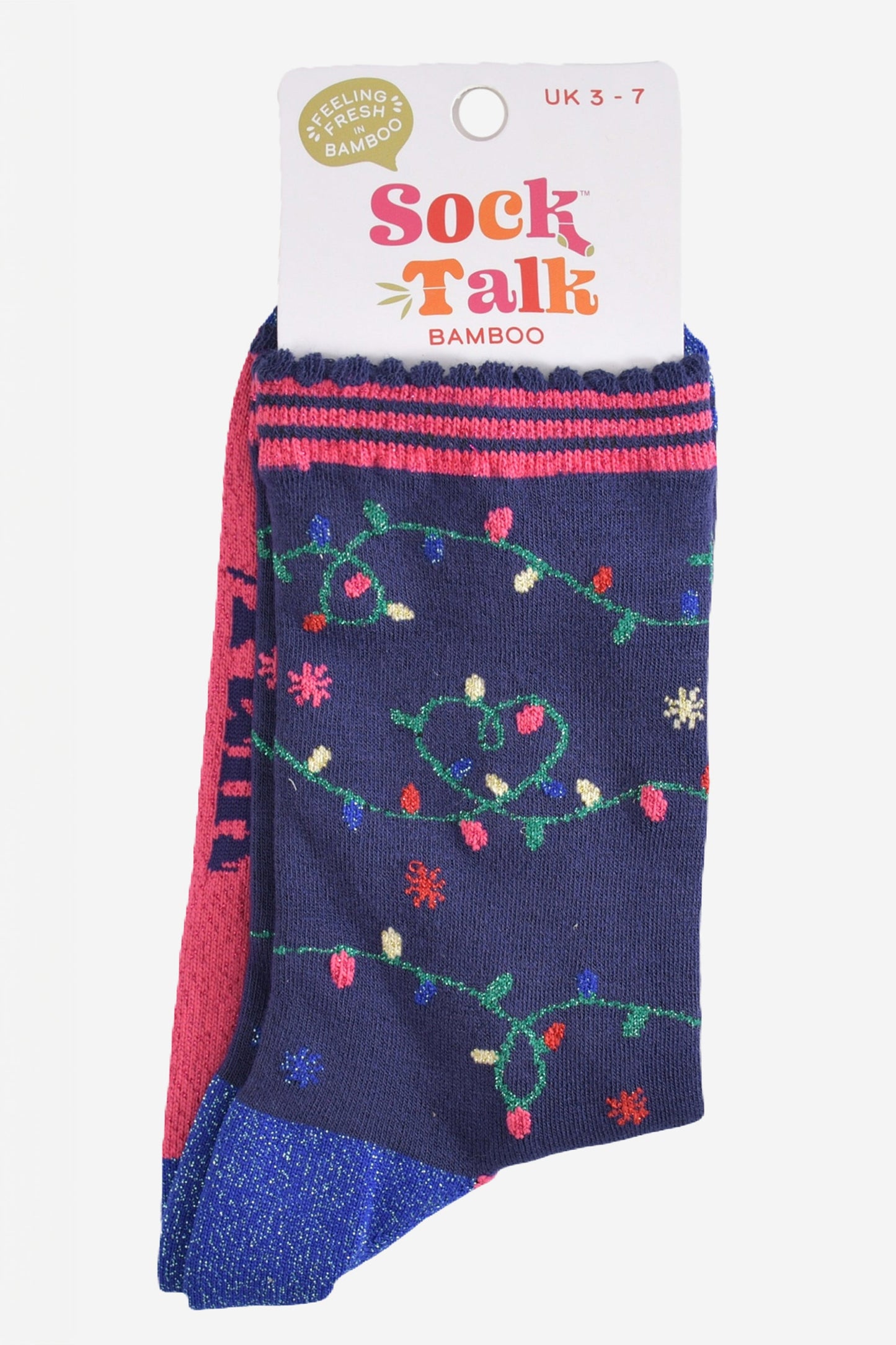 festive party lights bamboo socks in their sock talk packaging, these socks are a uk size 3-7