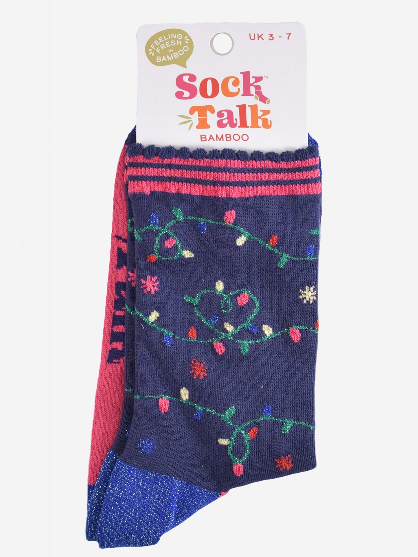 festive party lights bamboo socks in their sock talk packaging, these socks are a uk size 3-7