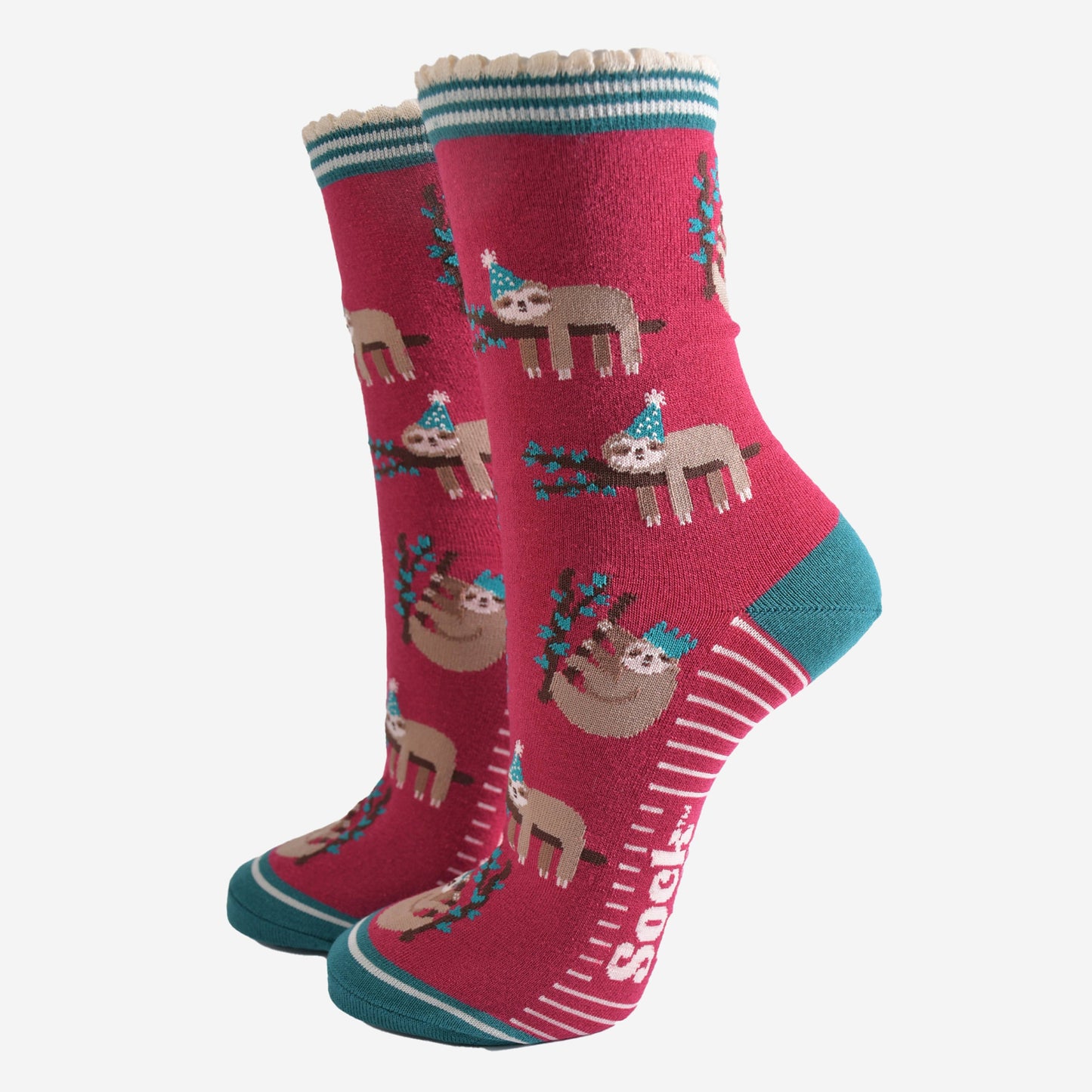 berry red socks with a green heel, toe and striped cuff with a pattern of sleepy sloths wearing xmas hats