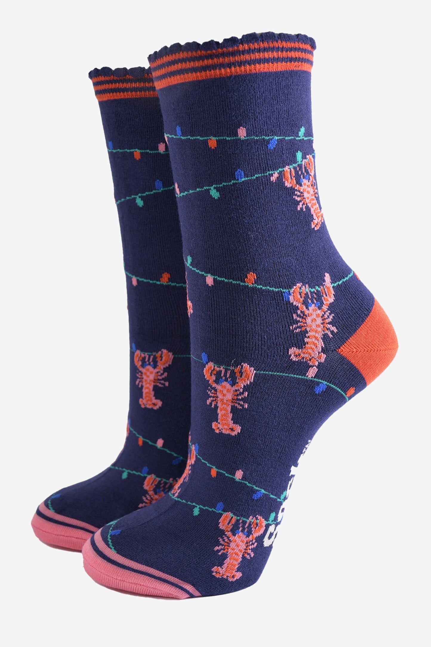 navy blue bamboo socks with a pattern of colourful party lights with pink and red lobsters playfully dangling from them