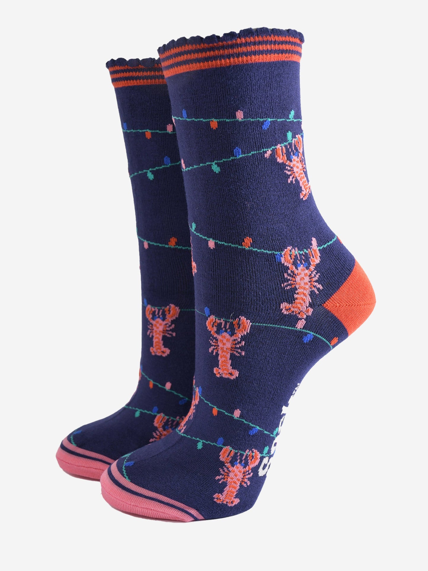 navy blue bamboo socks with a pattern of colourful party lights with pink and red lobsters playfully dangling from them