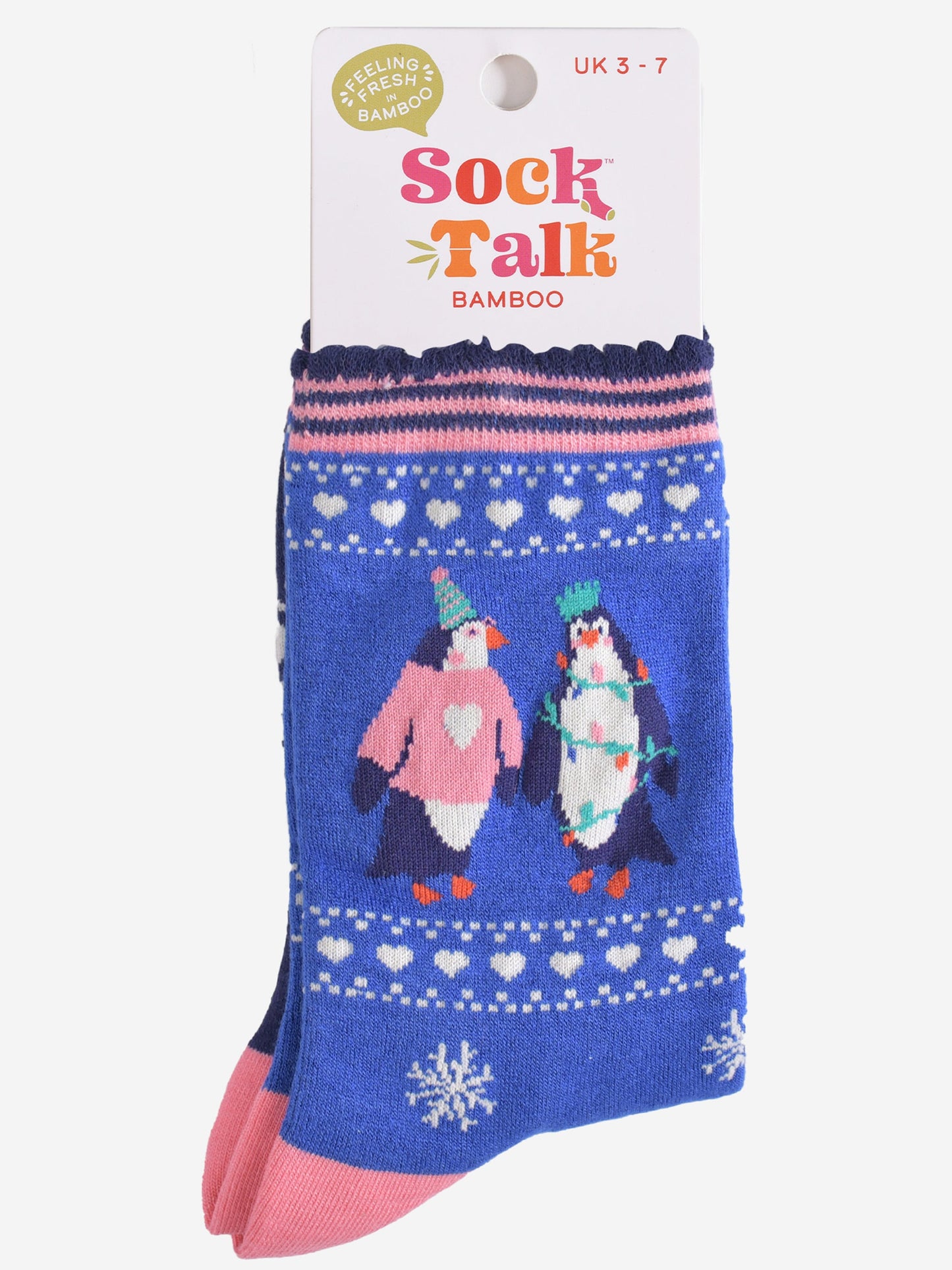 party penguin bamboo socks in their sock talk packaging, these socks are a uk size 3-7