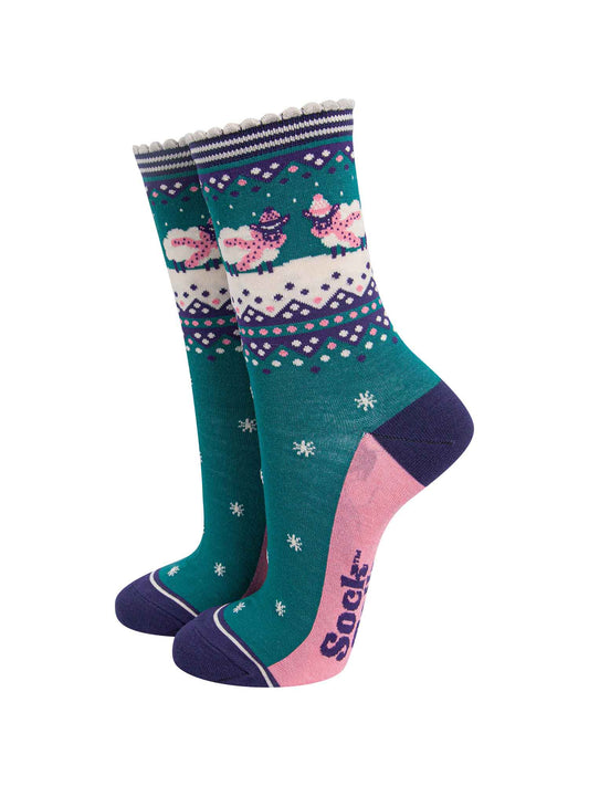 green, blue and pink ankle socks with sheep wearing cosy winter scarves and hats