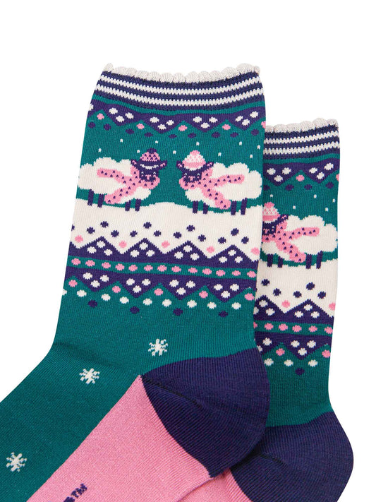 green, blue and pink ankle socks with sheep wearing cosy winter scarves and hats