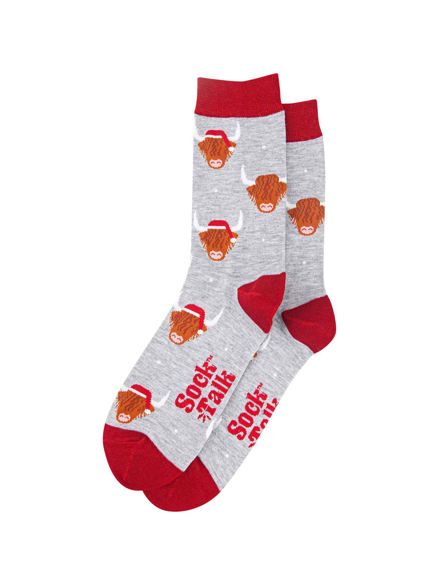 grey and red bamboo socks laying flat, showing the all over pattern featuring highland cows wearing red santa hats
