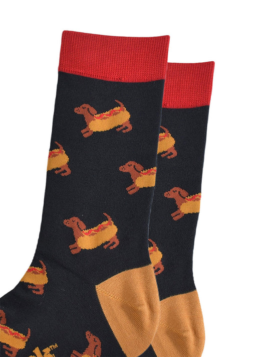 close up of the sausage dogs wearing a hotdog bun on the socks