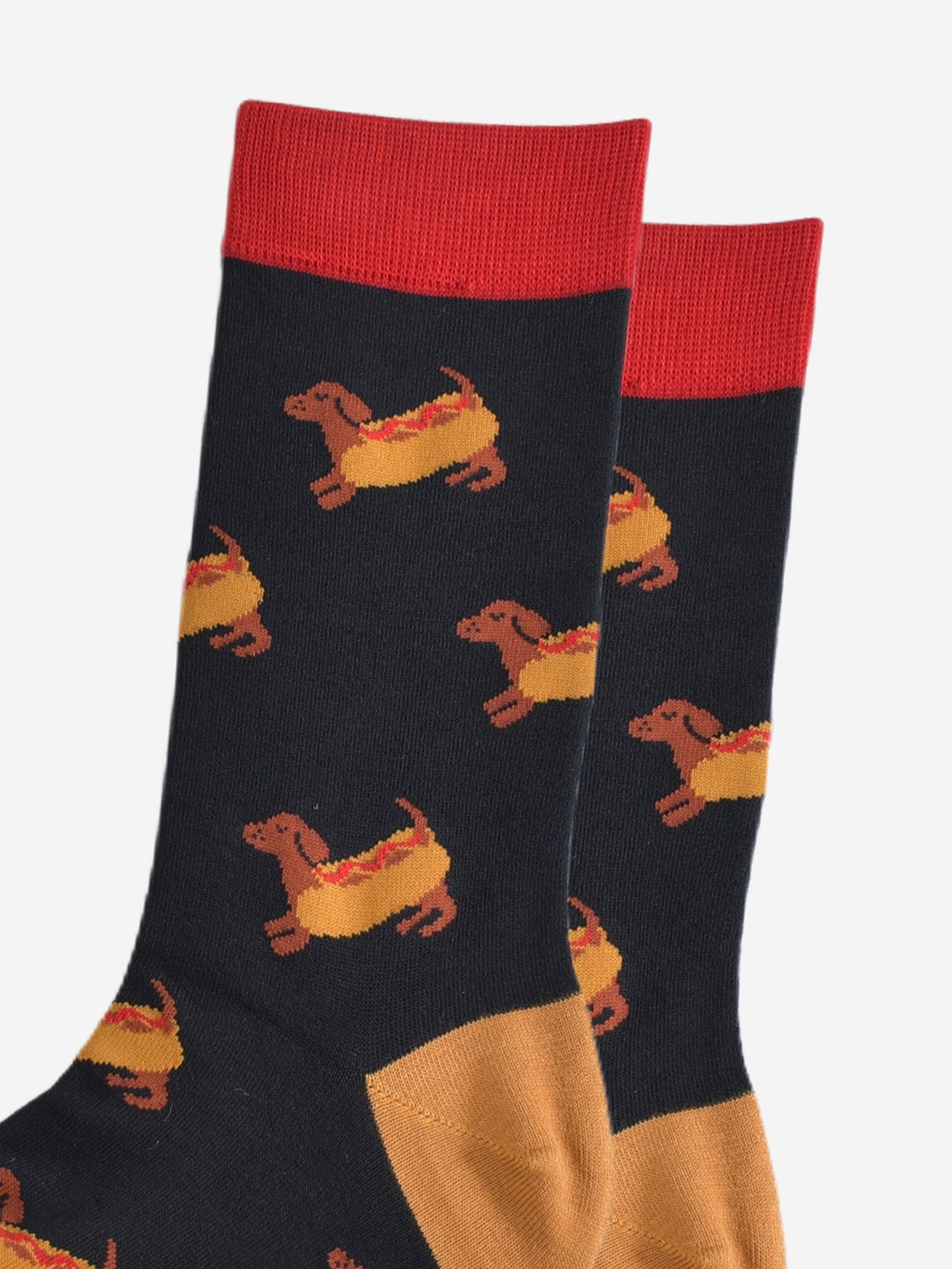 close up of the sausage dogs wearing a hotdog bun on the socks