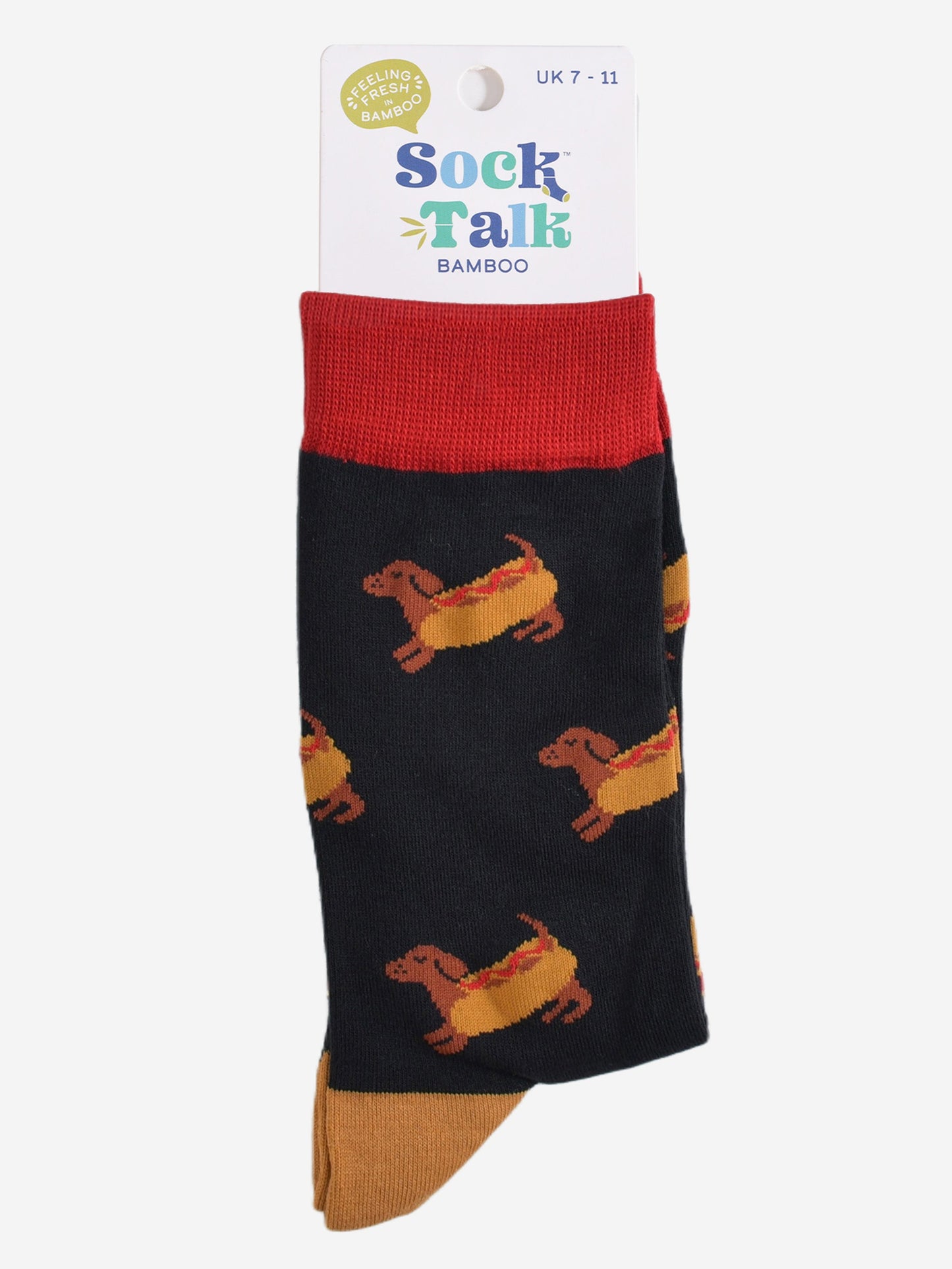 sausage dog hotdog socks in their sock talk packaging, the socks are a uk size 7-11