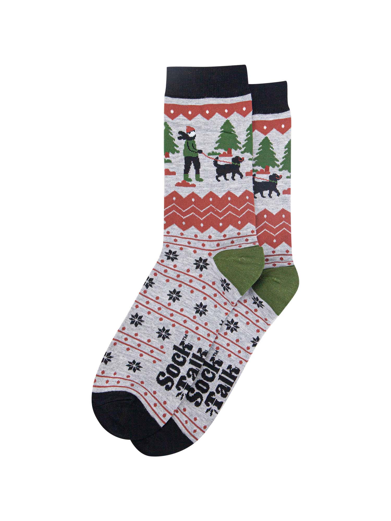 showing the socks laying flat, the toe is black, the heel is green and the fair isle pattern is all over the design. the dog walker scene is prominent on the ankle