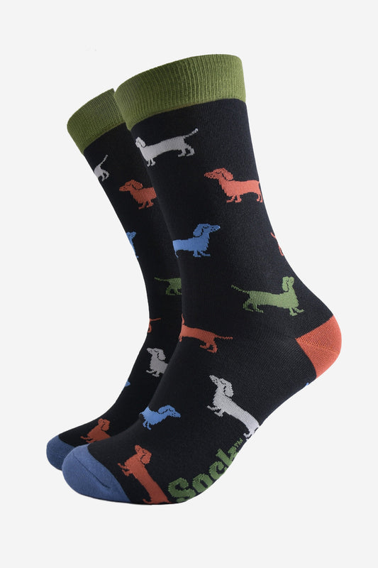 black socks with an all over pattern of mutlicoloured sausage dogs