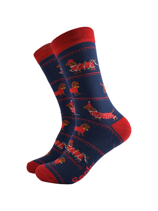 navy blue socks with a pattern on sausage dogs playing with party lights and wearing party hats