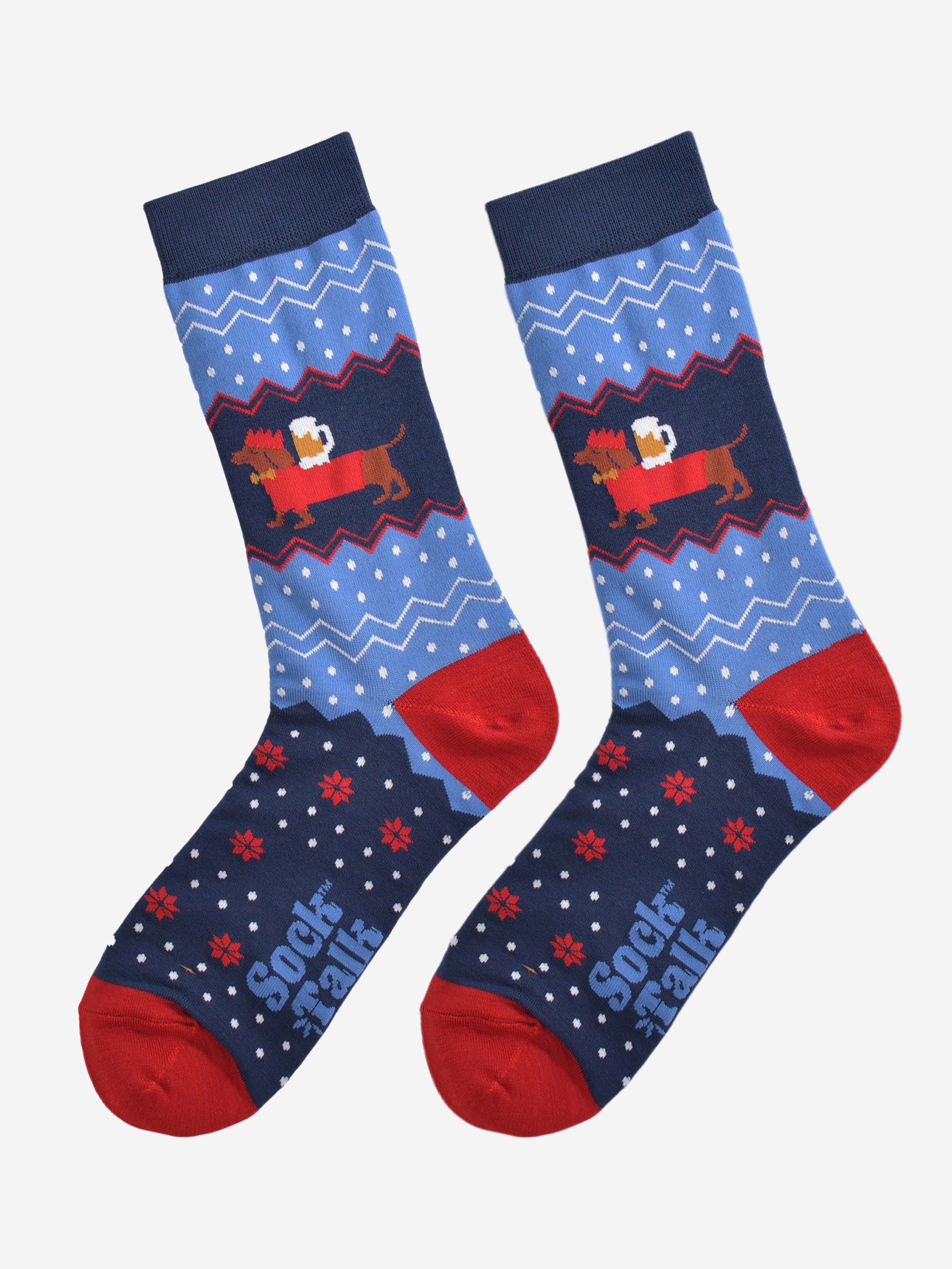 sausage dog beer socks laying flat, showing the blue and red fair isle pattern and the sausage dog carrying a pint of beer on its back